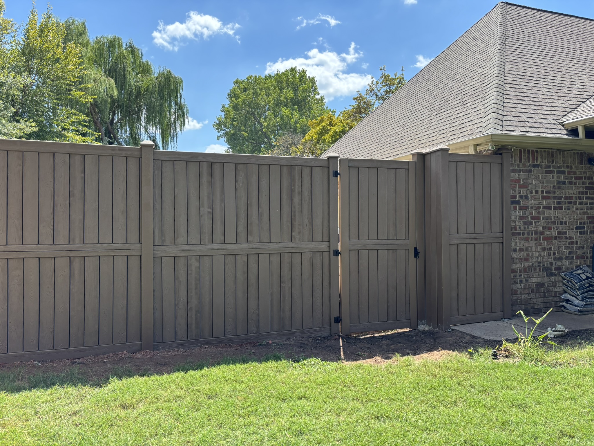 Wooden privacy fence installed by Midland Vinyl Products near Cleveland County, offering durable fencing solutions.