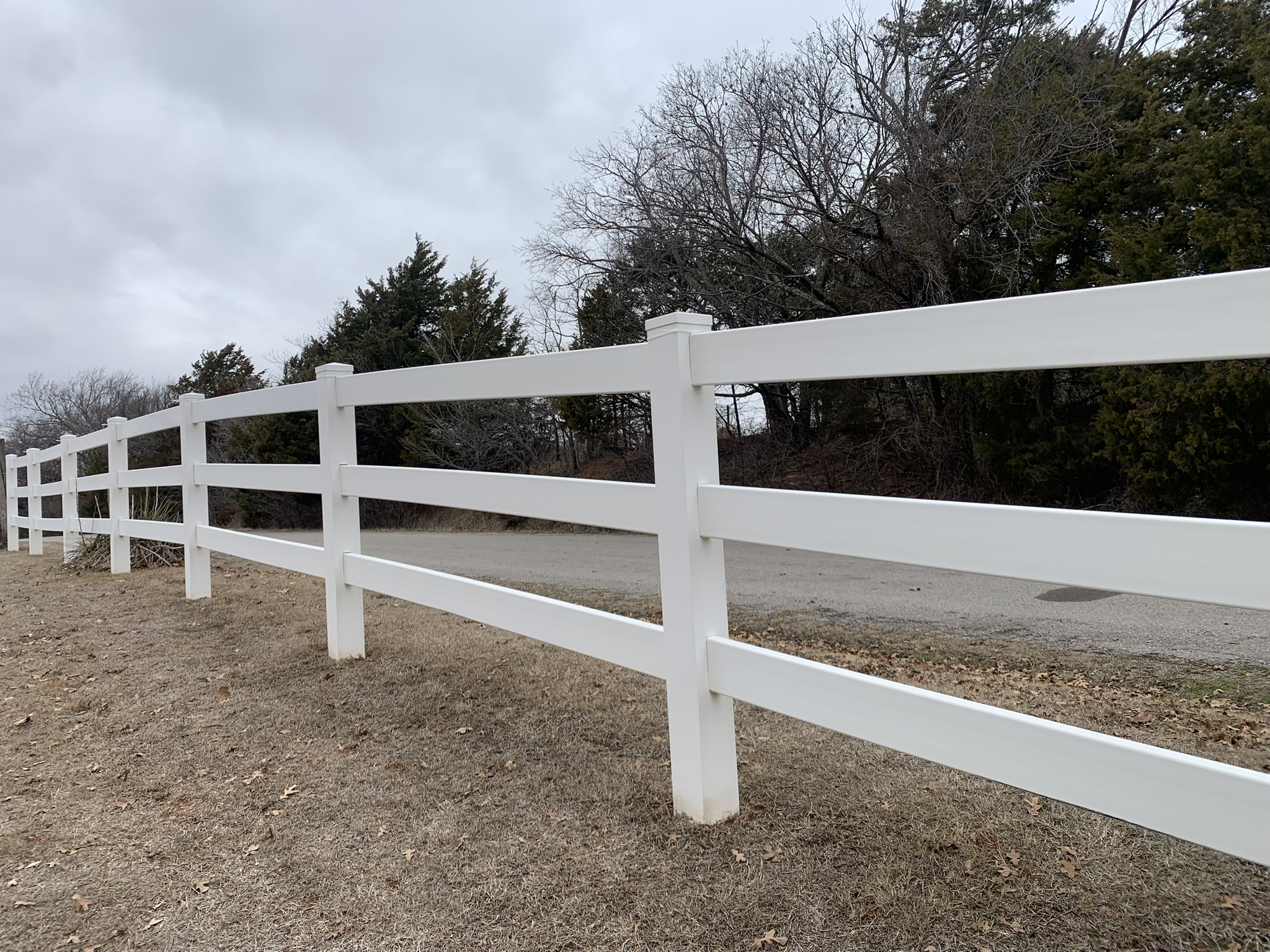 Stylish white vinyl fence installed by Midland Vinyl Products near me in Grady County, providing quality fencing solutions.